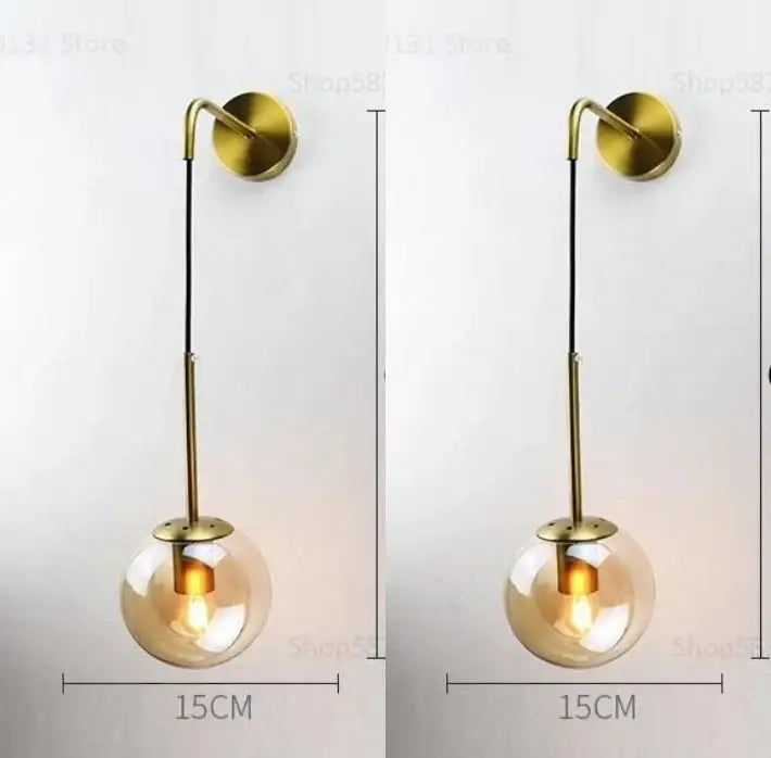 Modern brass and glass ball wall lamp for bedroom decor