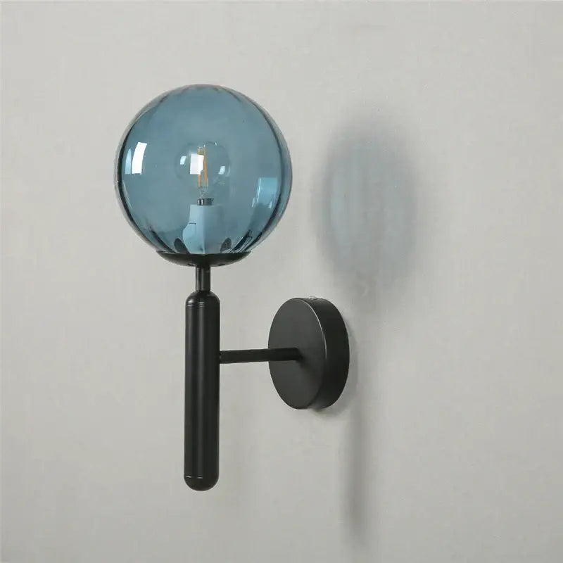 Modern brass and pink glass wall lamp for living room