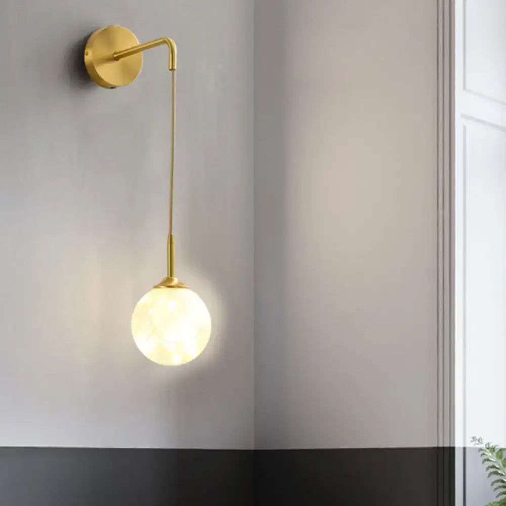 Modern gold wall lamp with frosted glass shade bedroom sconce