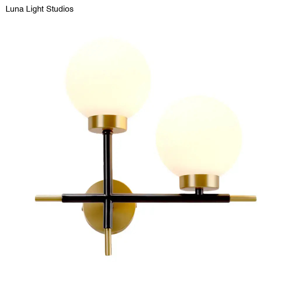 Post-modern white and brass sphere wall sconce bedroom light
