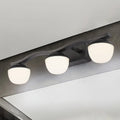 Wave design black metal wall lighting with frosted glass for bedroom